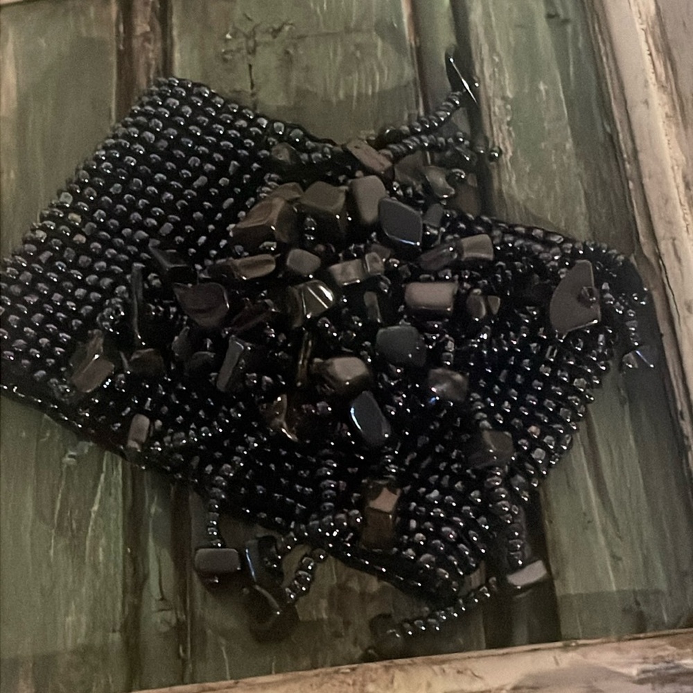 Thick seed bead bracelet with fun dangle details